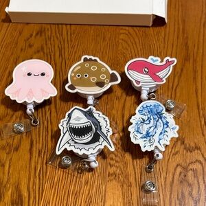 retractable badge reels ocean themed. Set of 5. new in box